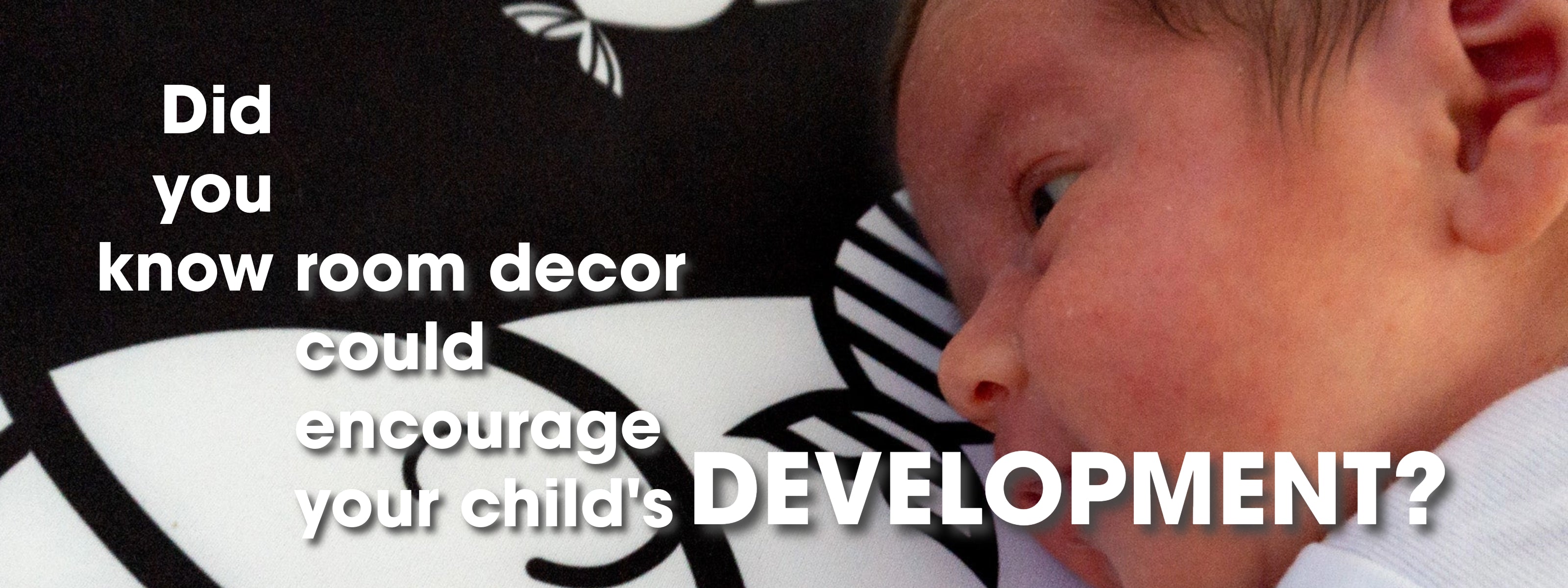 A newborn baby on the right looks at a high contrast image of a fish smiling. The caption reads "Did you know room decor could encourage your child's development?".