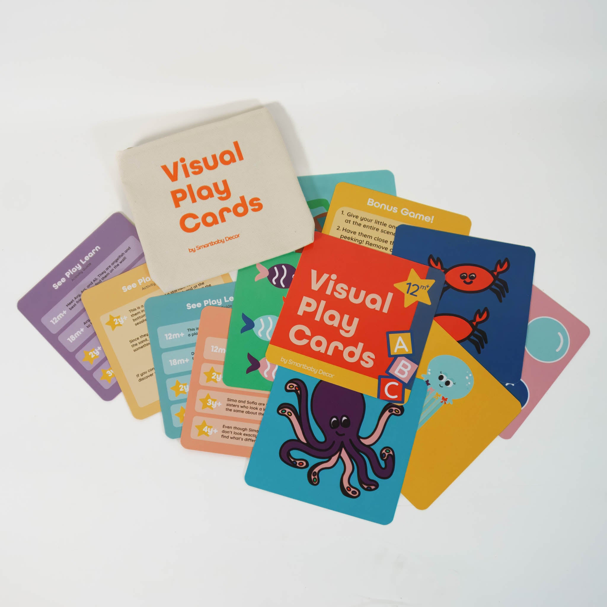 A set of 12 colorful activity cards for toddlers displayed with some facing up and some facing down. One side has age-appropriate activities, the other has an ocean character such as an octopus or crab. A canvas carrying case is also shown.