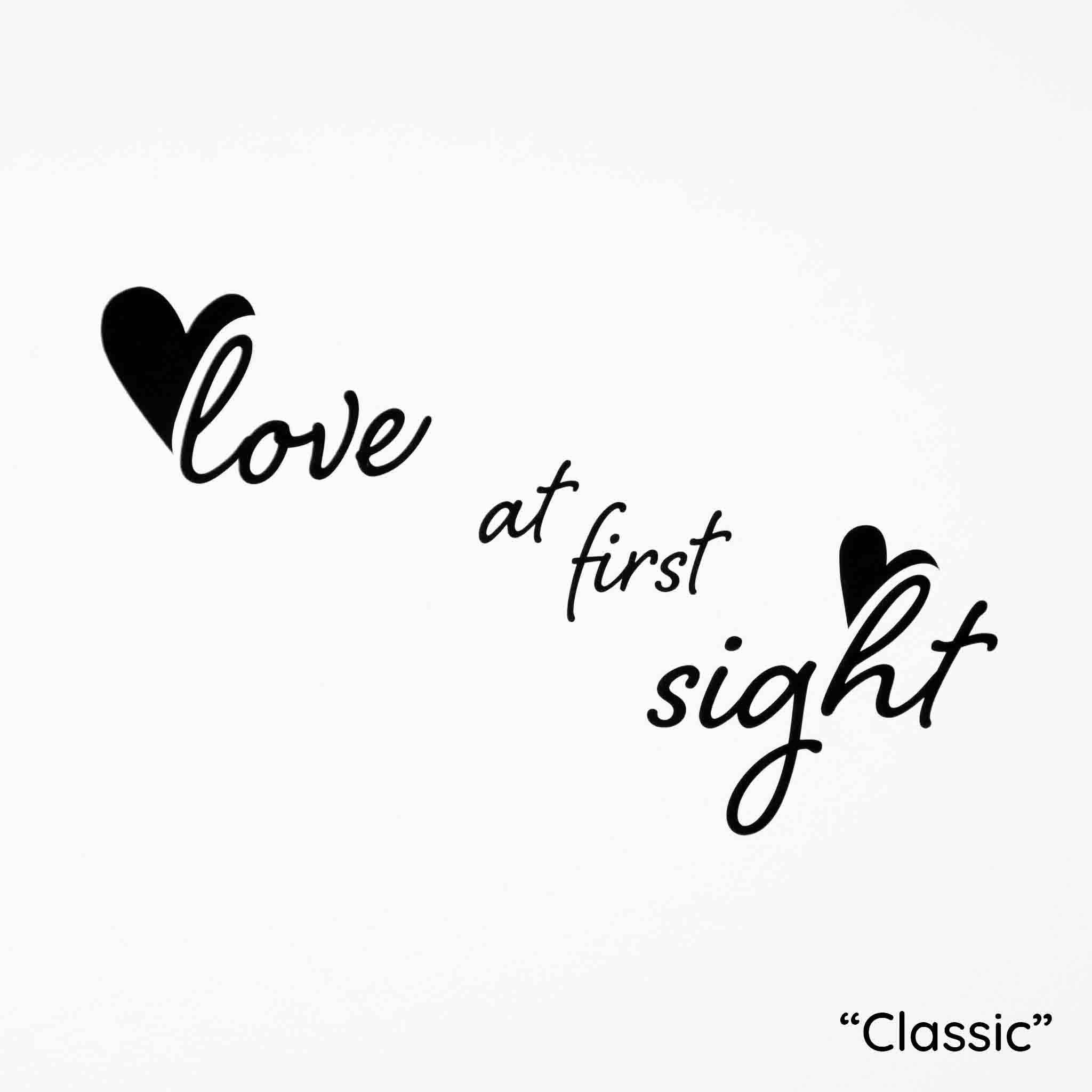 White background with the phrase "Love at first sight" in black, cursive font.