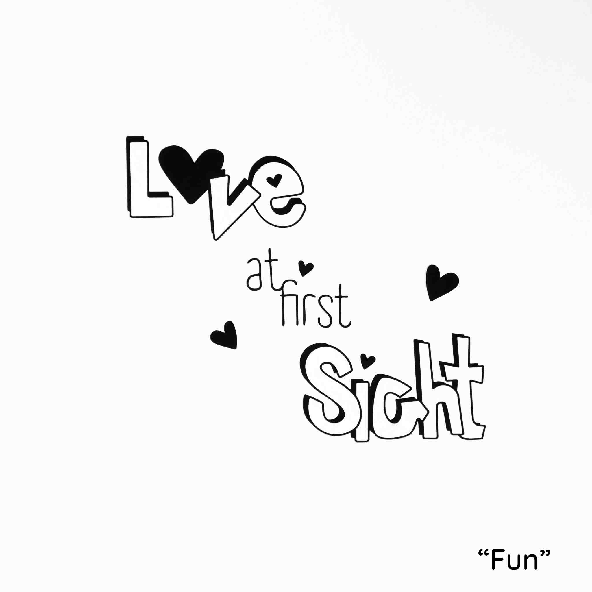 White background with phrase "Love at first sight" in black high contrast font.